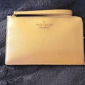 Kate Spade 3/4 zip-around pocket wallet.